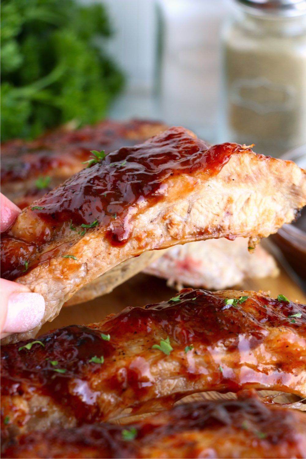 piece of BBQ ribs with sauce on them