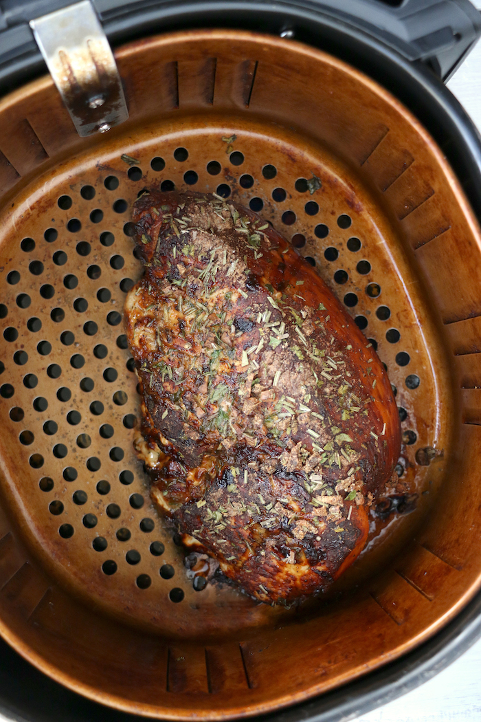 Air Fryer Turkey Breast - Garlic and fresh herb-seasoned turkey in the air fryer - moist and juicy on the inside with a crispy, golden brown skin on the outside.
