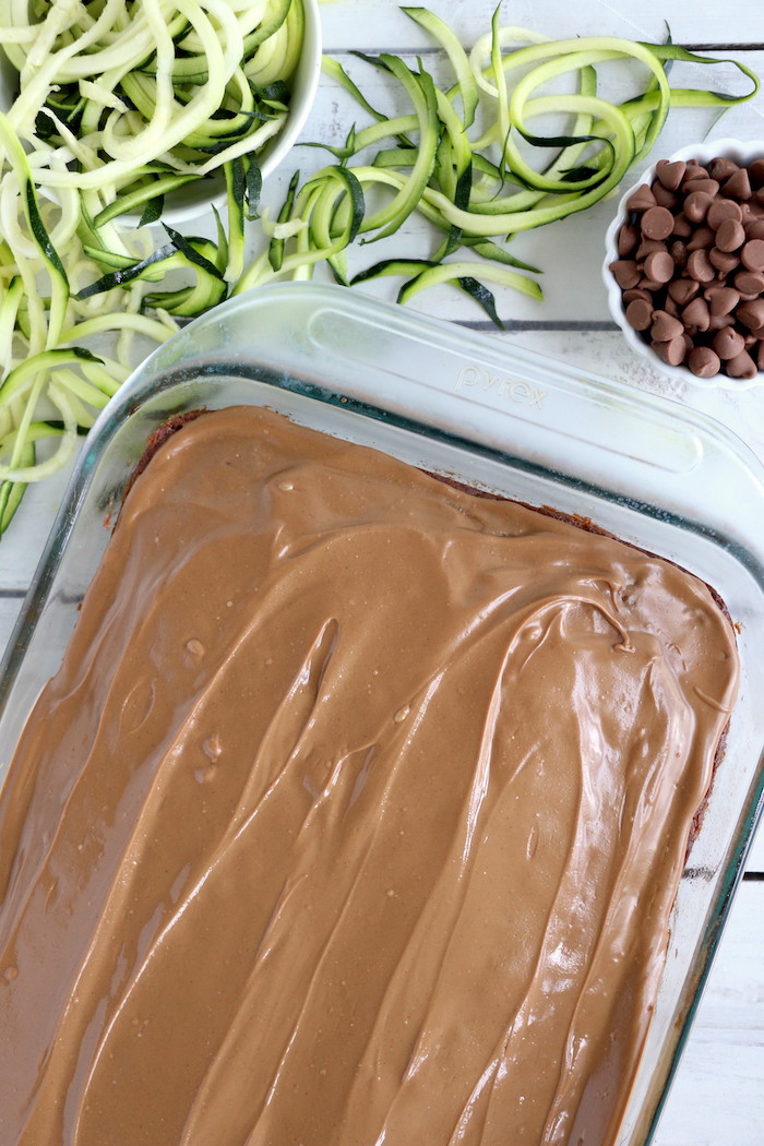 Zucchini Cake - Rich and moist chocolate zucchini cake topped with chocolate peanut butter frosting. 