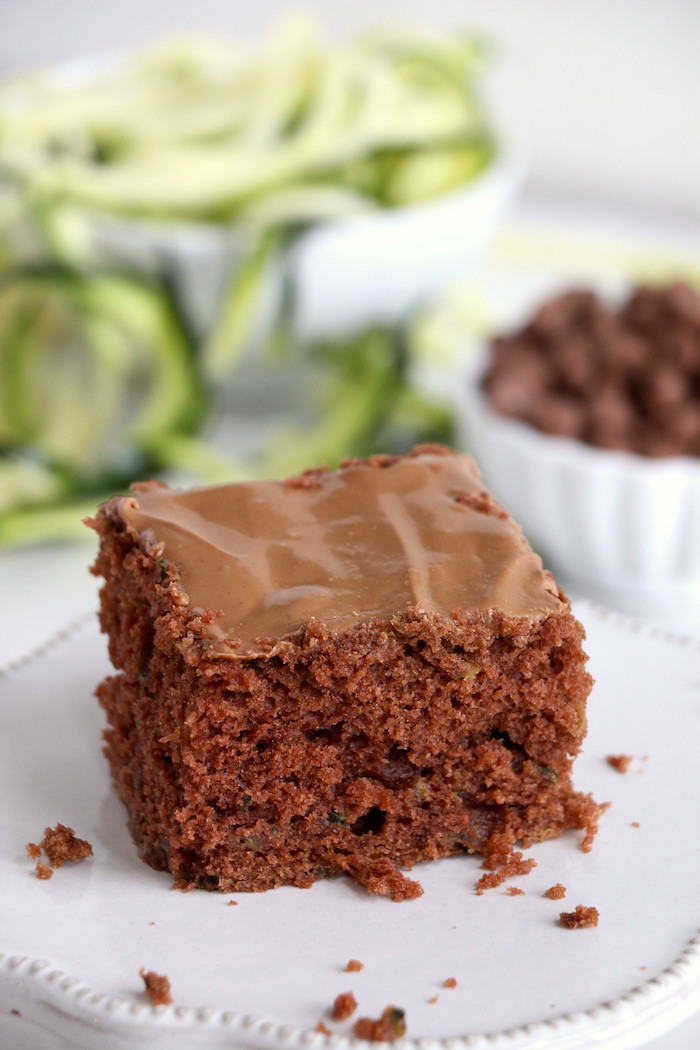 Zucchini Cake - Rich and moist chocolate zucchini cake topped with chocolate peanut butter frosting. 