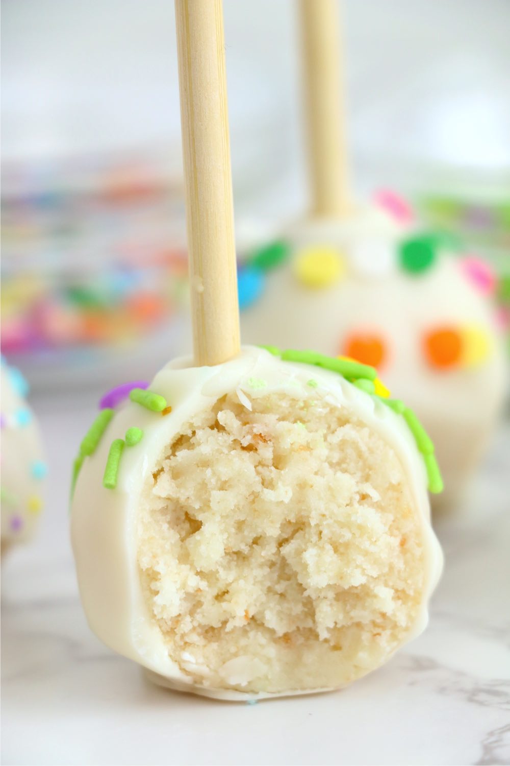 bite out of a vanilla cake pop