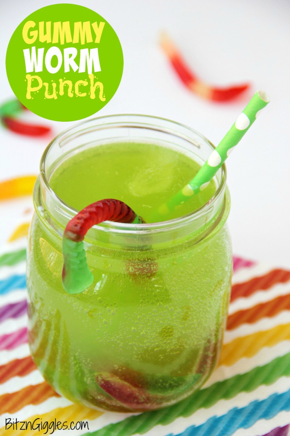 Gummy Worm Punch - Gummy worms are frozen in a punch mixture and emerge from the ice as the drink is enjoyed! So much fun and perfect for birthday parties and Halloween!