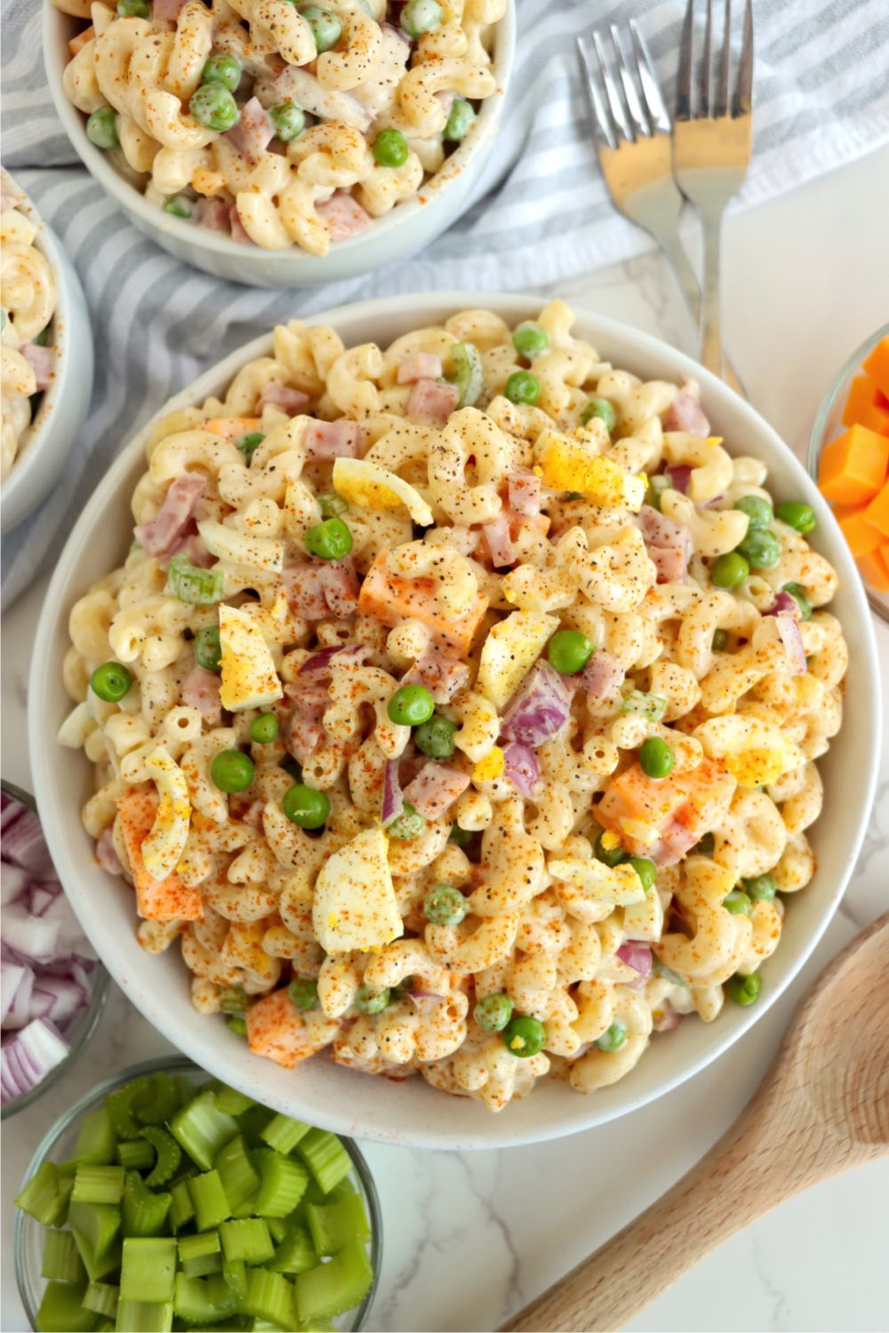 overhead view of pasta salad with egg and ham