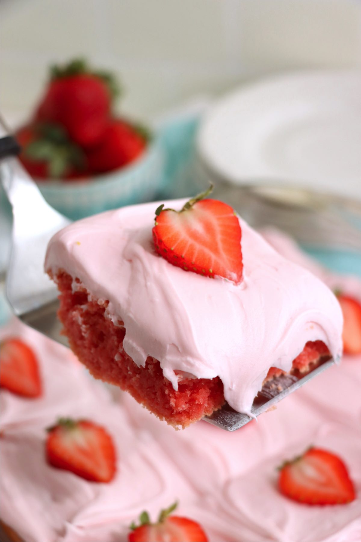 serving spatula holding a strawberry brownie