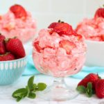 glass dessert dish filled with strawberry fluff