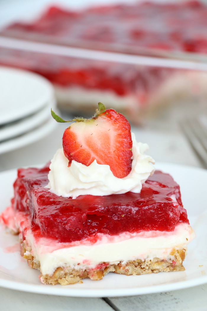 Strawberry Pretzel Dessert - This classic, potluck favorite features a crunchy pretzel crust topped with sweet cream and an irresistible strawberry jello topping. It's the perfect combination of sweet and salty! 