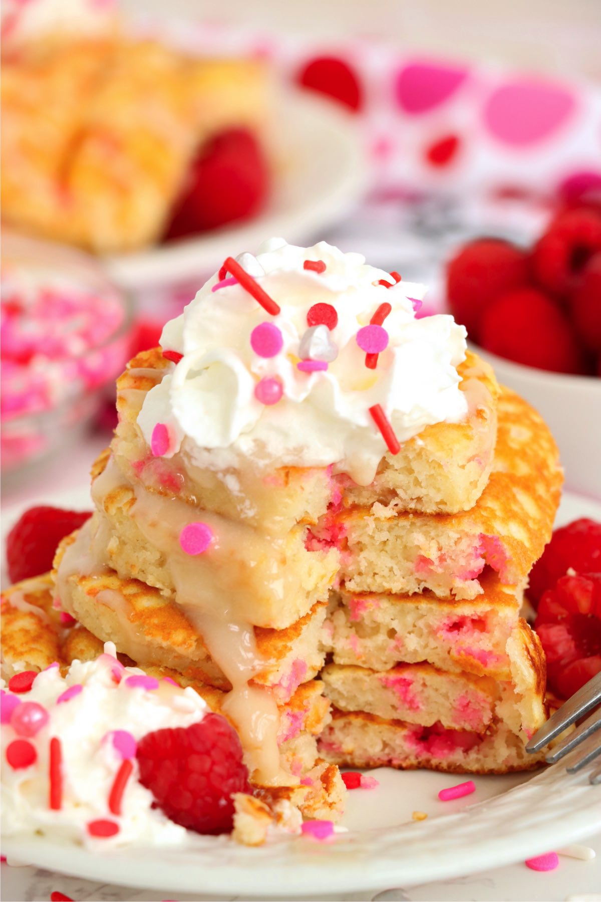 cut into stack of pancakes for Valentine's Day 