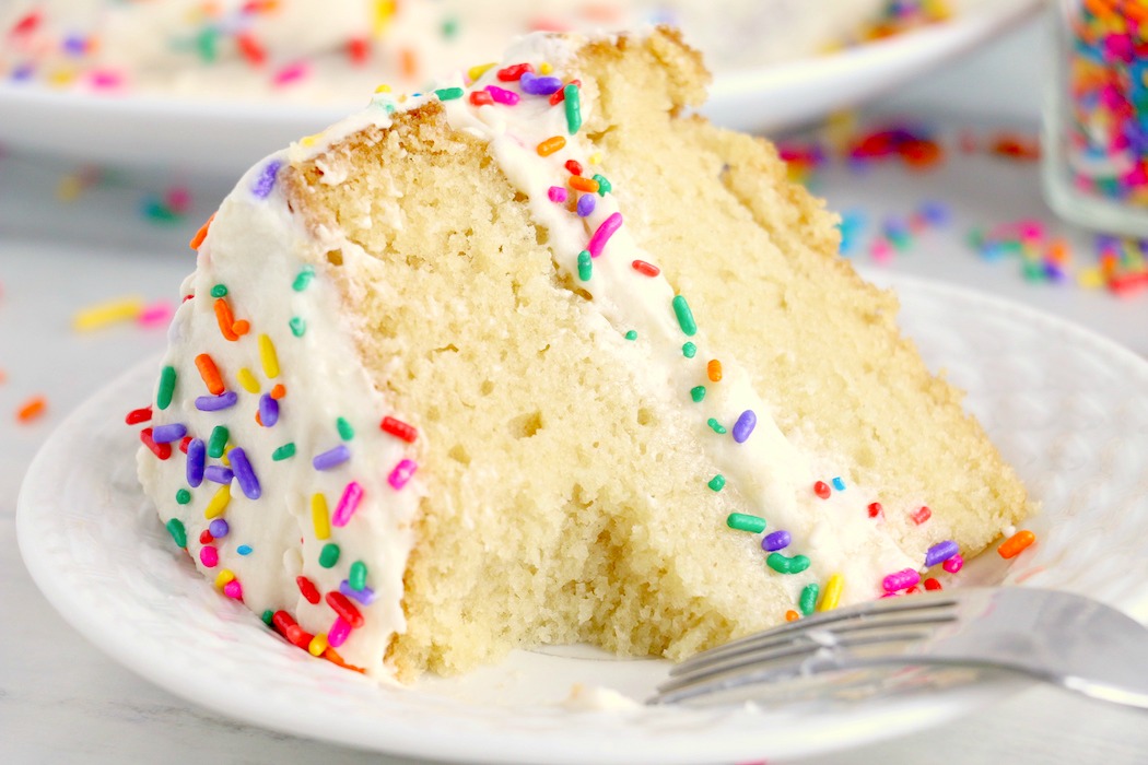 Vanilla cake with piece taken out